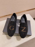 Giuseppe Zanotti Black Studded Gold Accent Loafers — hero