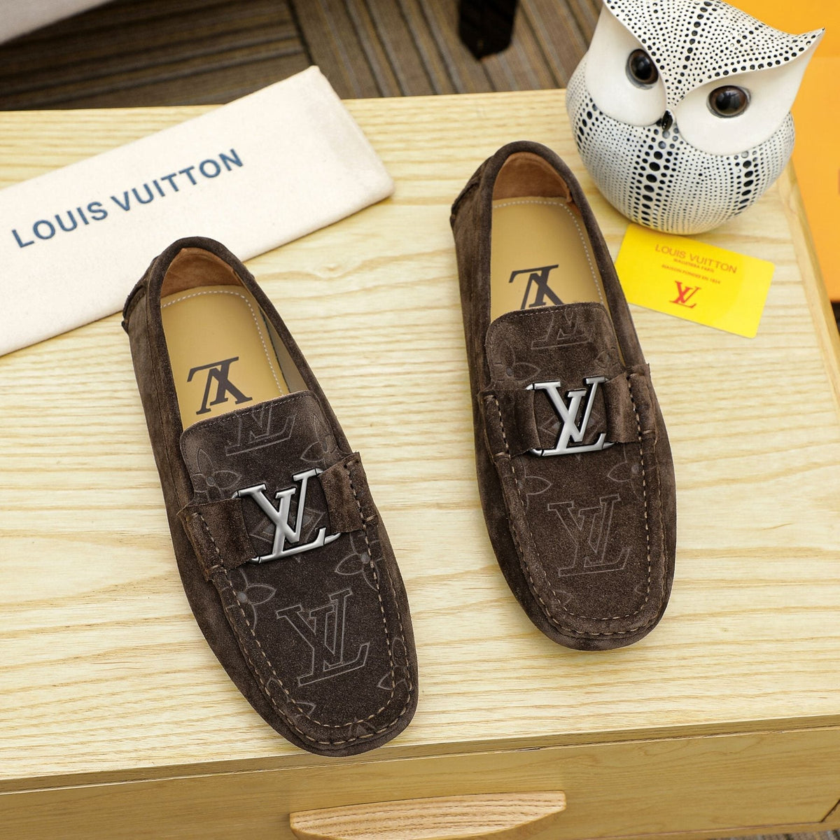 Louis Vuitton Embossed Driving Loafers — front