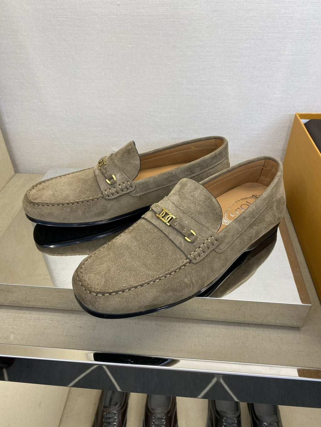 Tod's Gold-Tone Hardware Loafers — side