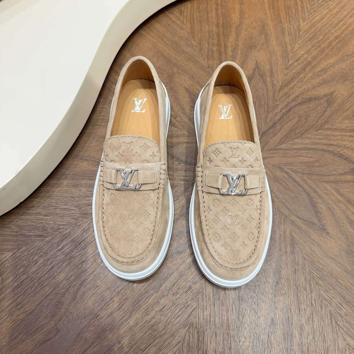 Louis Vuitton Embossed Slip-On Sneakers — front