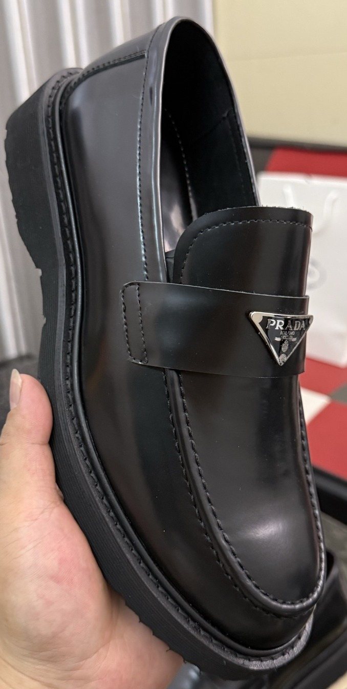 Prada Triangle Plaque Loafers — front
