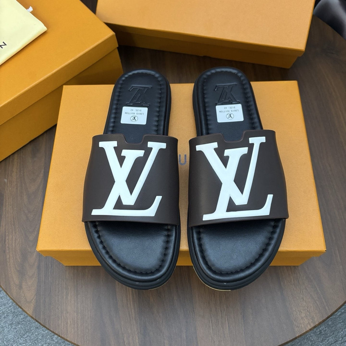 Louis Vuitton Raised-Monogram Slide Sandals — front