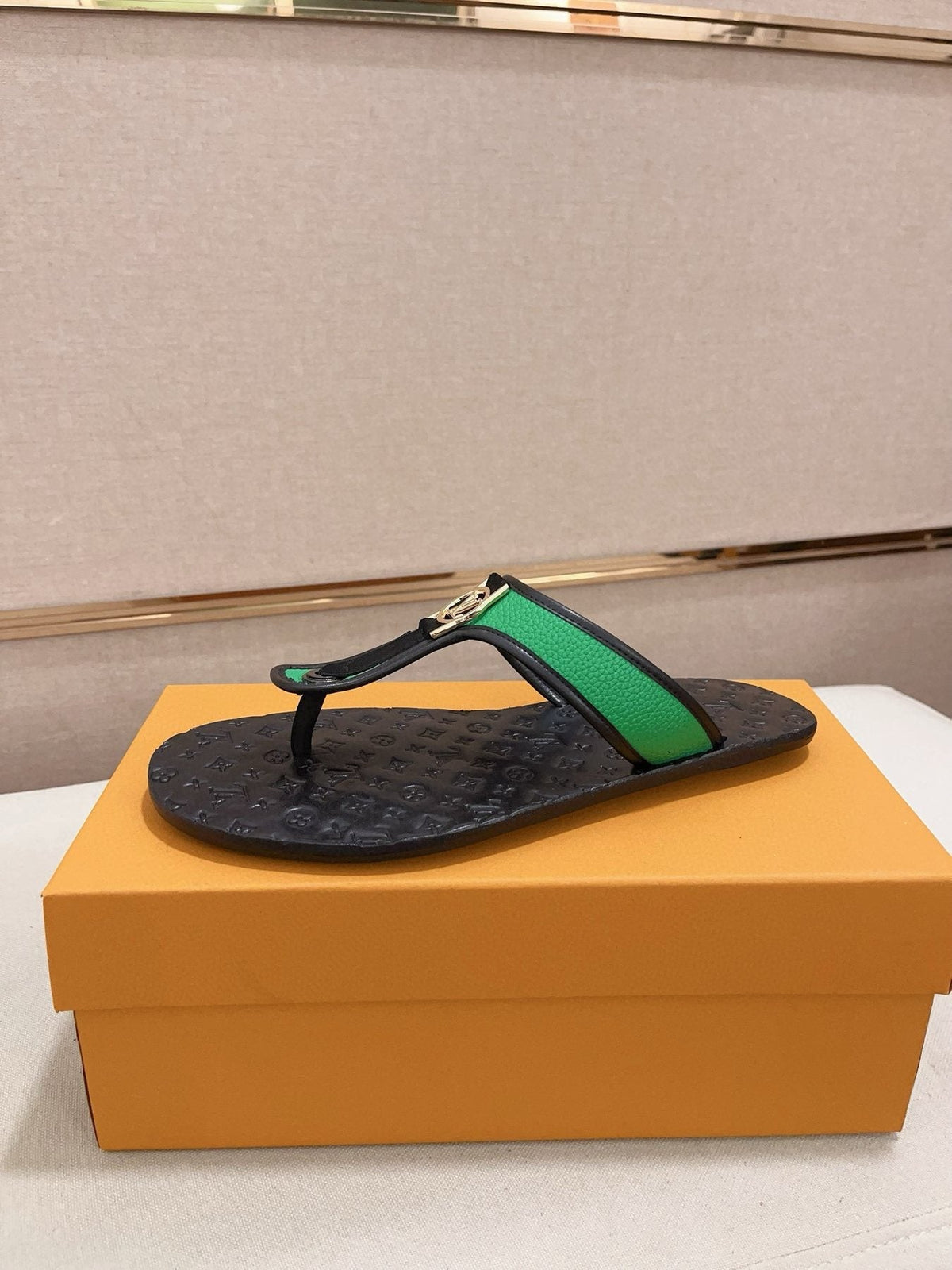 Louis Vuitton Emblem Thong Sandals — front