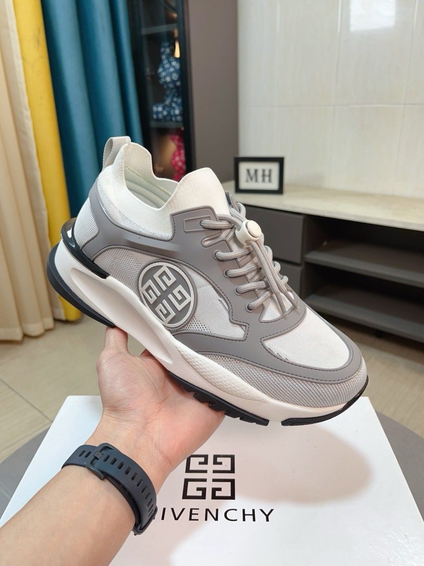 Givenchy Paneled Lace-Up Sneakers — model