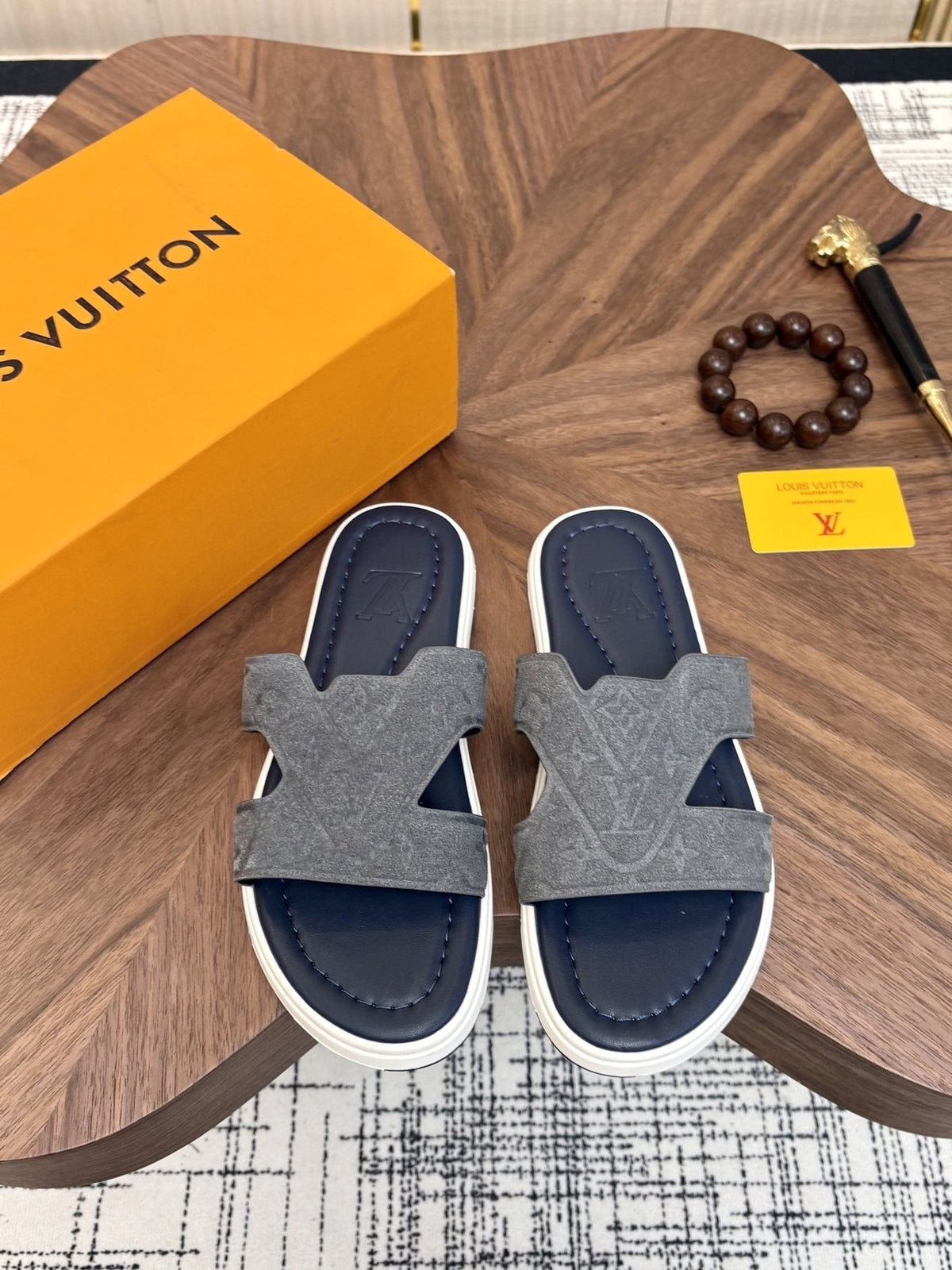 Louis Vuitton Embossed Navy Blue Slide Sandals — front
