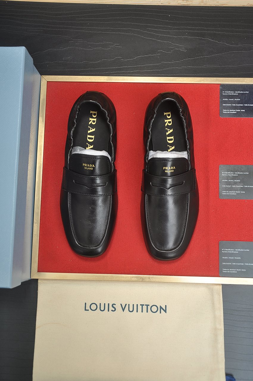 Prada Strap-Detail Slip-On Loafers — front