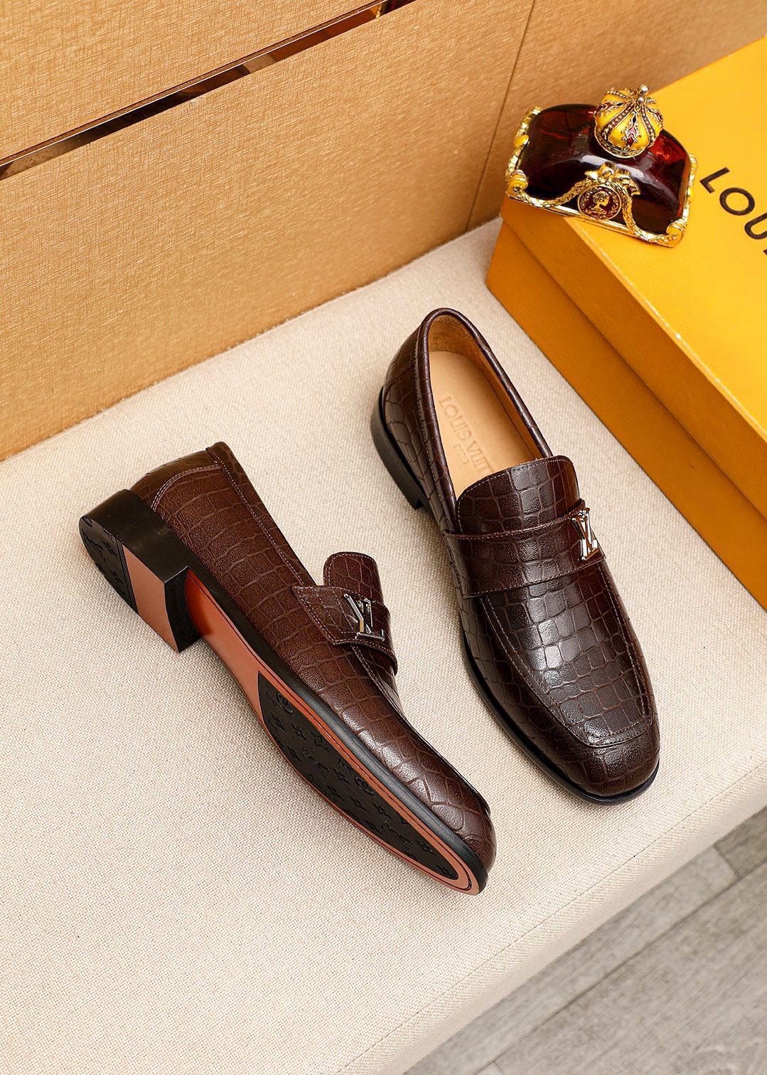 Louis Vuitton Embossed Metal-Accent Loafers — front