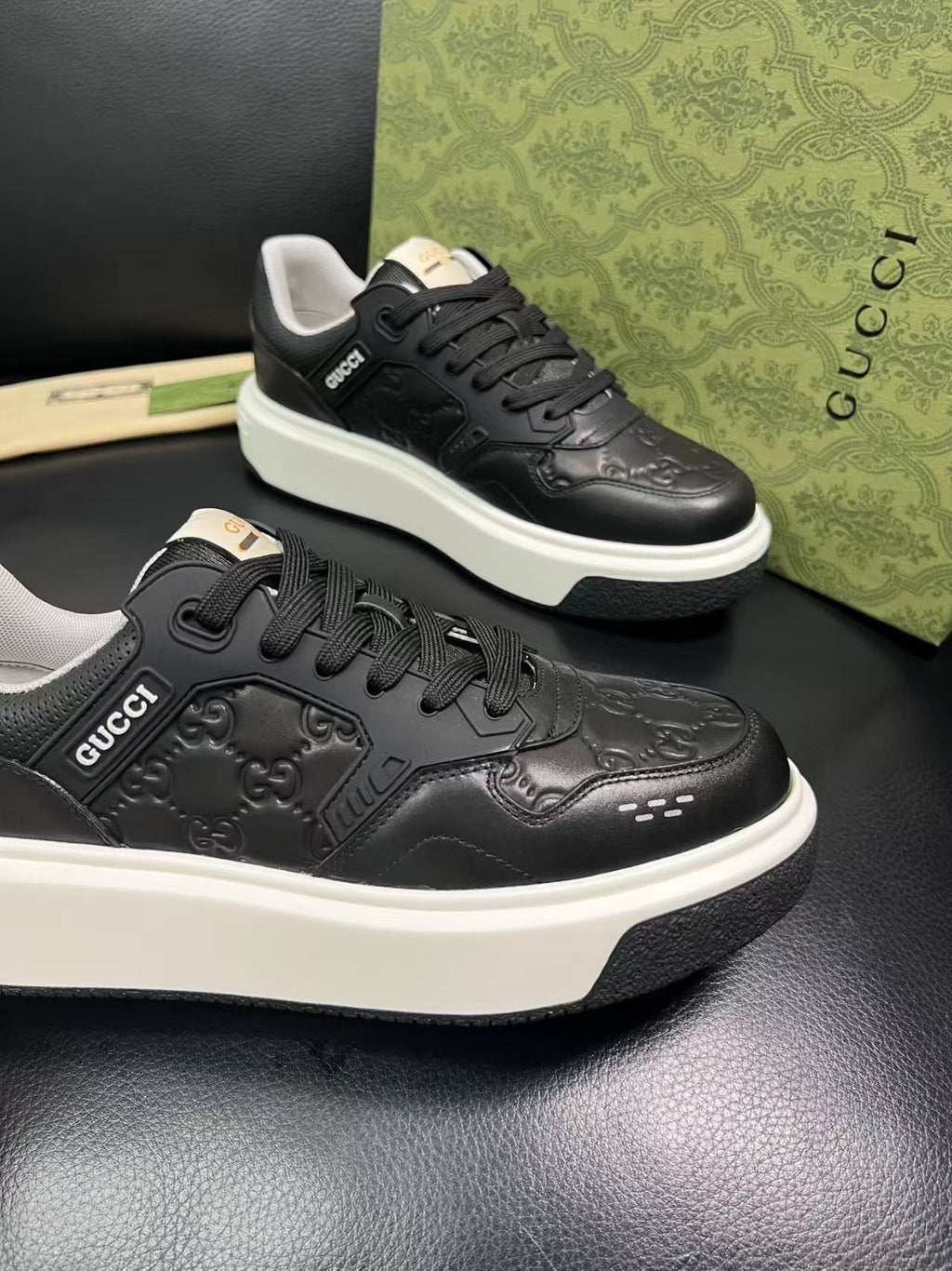 Gucci Embossed Low-Top Sneakers — side