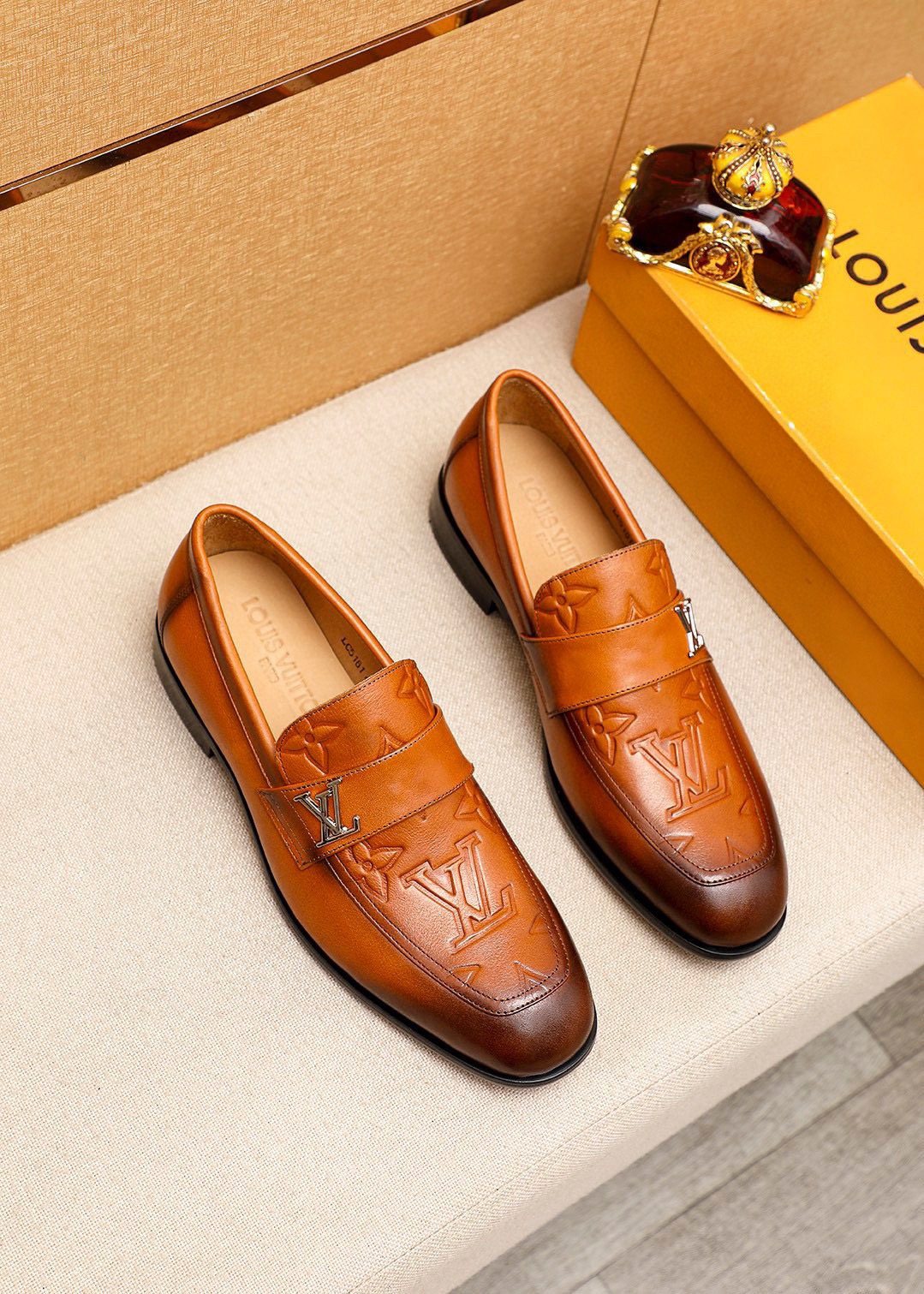 Louis Vuitton Embossed Leather Loafers — front