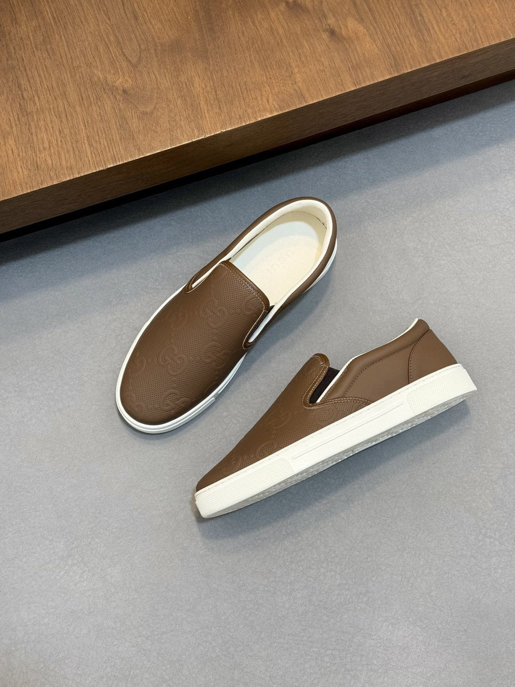 Gucci Embossed Slip-On Sneakers — front