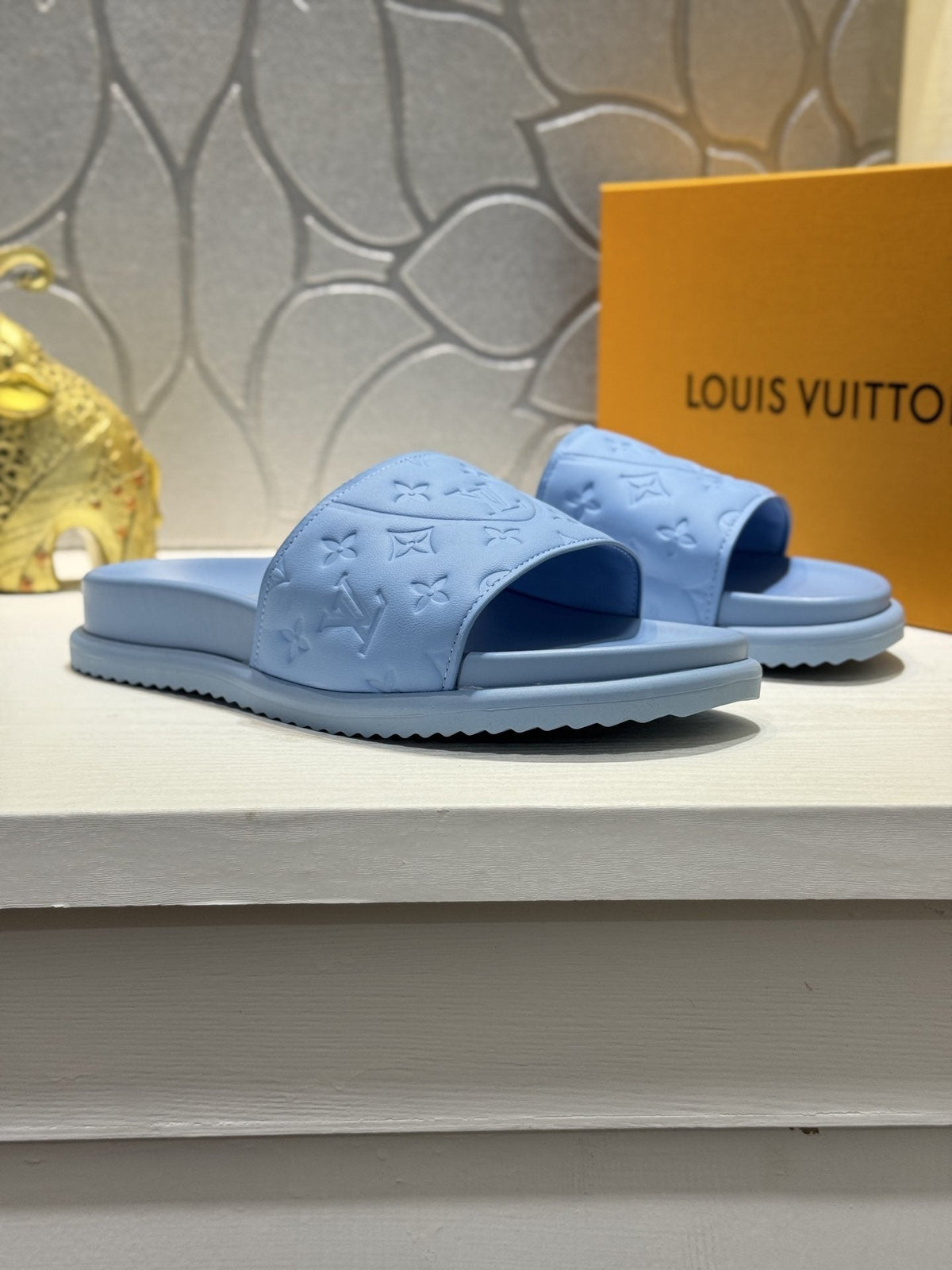 Louis Vuitton Embossed Slide Sandals — hero