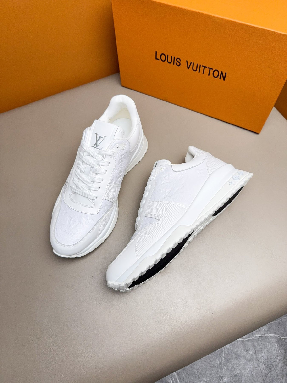 Louis Vuitton Embossed Low-Top Sneakers — side