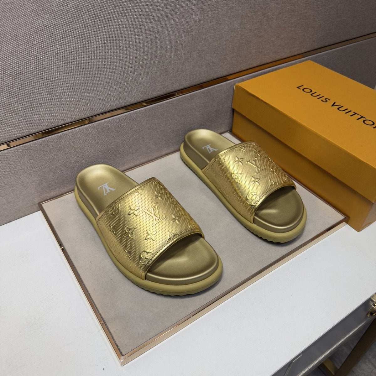Louis Vuitton Embossed Metallic Slide Sandals — front